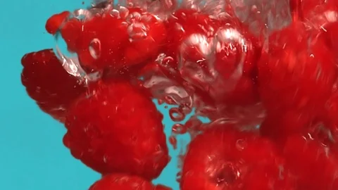 Raspberry diving into Water in Slow Motion Stock Footage 126718884