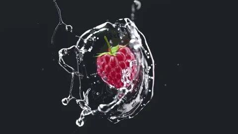 Raspberry falling in water splash slow motion, depth of field Stock Footage 279987364