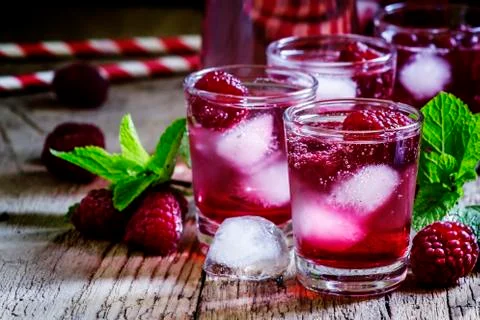 Raspberry fizzy drink, selective focus Stock Photos