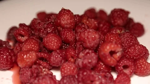 Raspberry fruit backgroundFresh and sweet red raspberries texture background. Stock Footage 92142184