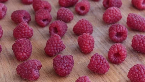 Raspberry Fruit on Wooden Background. Stock Footage 77042120
