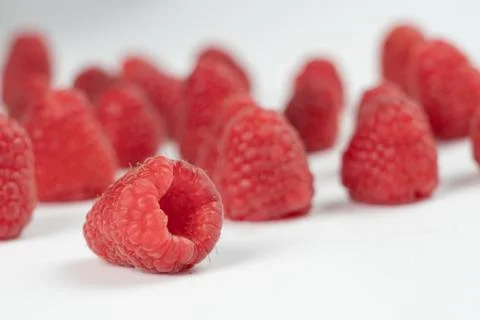 Raspberry fruits on a white background Stock Photos