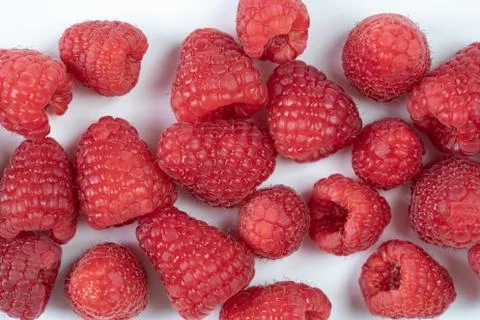 Raspberry fruits on a white background Stock Photos