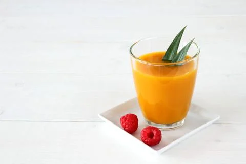 Raspberry, fruity mango smoothie made from ripe fruit Stock Photos
