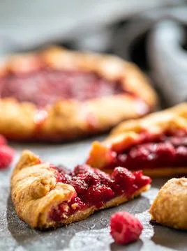 Raspberry galette or raspberries rustic tart slice 스톡 사진