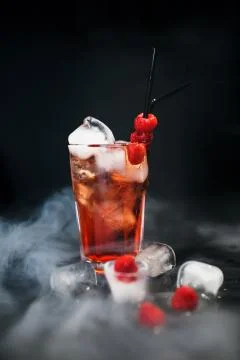 Raspberry ice cold refreshing cocktail with berries. Flat lay, Front view. Sm Foto stock