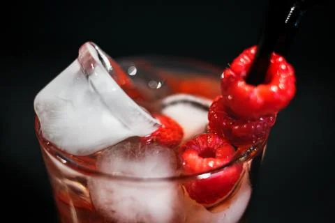 Raspberry ice cold refreshing cocktail with berries. Flat lay, Front view. Sm Stock Photos