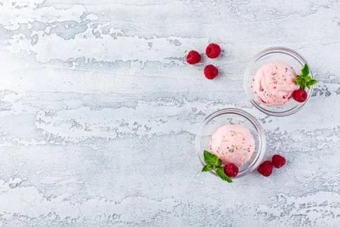 Raspberry ice cream in bowl Stock Photos