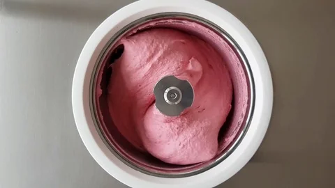 Raspberry Ice Cream Churning in Ice Cream Machine 2 4K Stock Footage 78066410