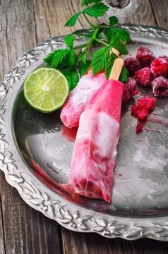 Raspberry ice cream with old tray Stock Photos
