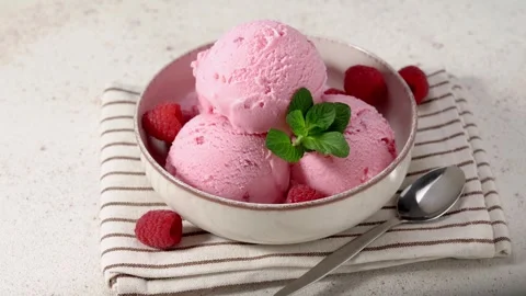 Raspberry ice cream in a plate Stock Footage 266587190