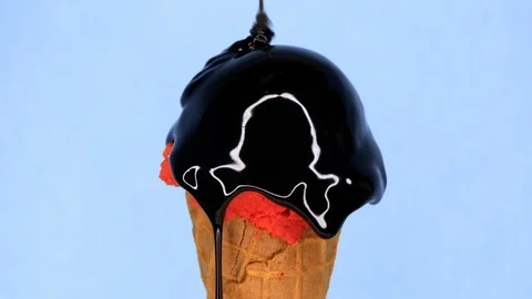 Raspberry ice-cream in waffle cone rotating on violet background and liquid Stock Footage 106068038