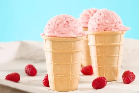 Raspberry ice cream in a waffle Stock Photos