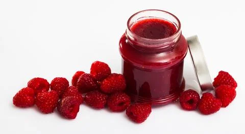 Raspberry jam and fresh raspberries Stock Photos