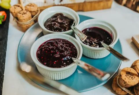 Raspberry Jam on Plate Stock Photos