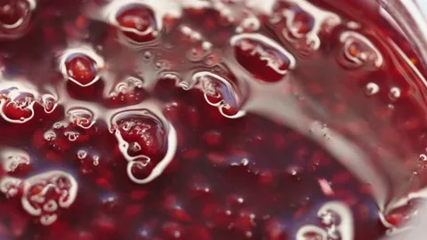 Raspberry jam rotates in a circle. High quality 4k footage Stock Footage 219937863