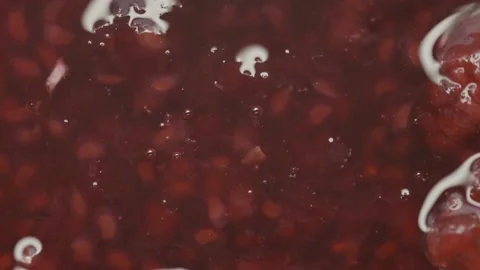 Raspberry jam rotates in a circle. High quality 4k footage Stock Footage 219937958