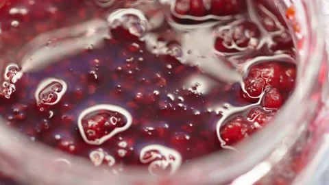 Raspberry jam rotates in a circle. High quality 4k footage Stock Footage 219938003