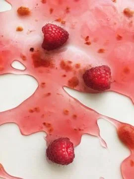 Raspberry jelly on a white background Stock Photos