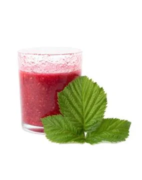 The raspberry juice with pulp leaves on white background Stock Photos