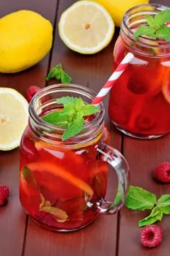 Raspberry lemonade in a jars Stock Photos