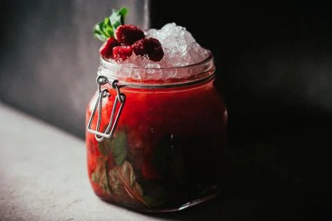 A raspberry lemonade sitting on a table Stock Photos