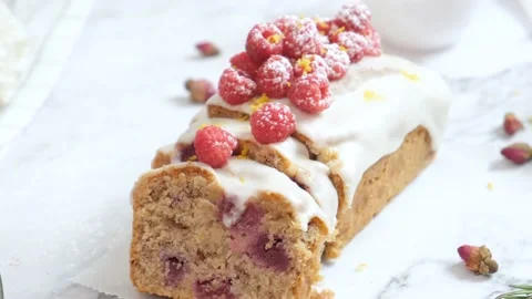 Raspberry loaf cake with lemon glaze. Stock Footage 171588276