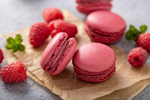 Raspberry macarons with fresh berries Stock Photos