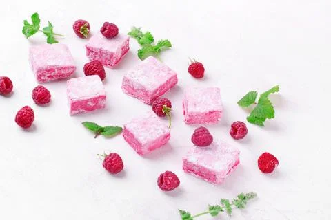 Raspberry marshmallow on white Stock Photos