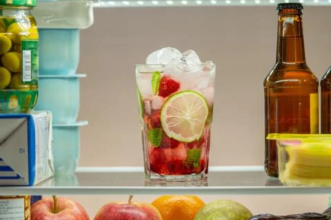 Raspberry mojito cocktail in a fridge. Stock Photos
