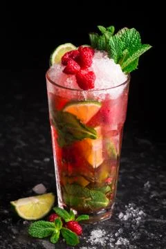 Raspberry Mojito on a table Stock Photos