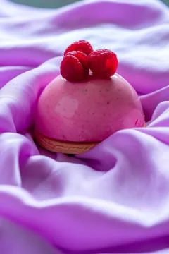 Raspberry Mousse Tartlet Decorated by Fresh Delicious Raspberries on Top on L Stock Photos