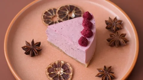 Raspberry or strawberry cheesecake, a slice of sweet red cake with berries. Rasp Stock Footage 321244191