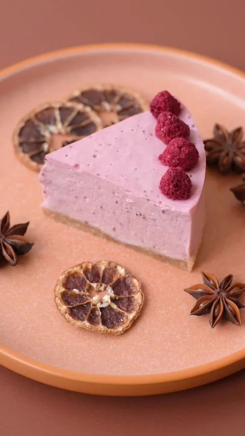 Raspberry or strawberry cheesecake, a slice of sweet red cake with berries. Rasp Stock Footage 321244201
