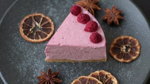Raspberry or strawberry cheesecake, a slice of sweet red cake with berries. Rasp Stock Footage 321244223