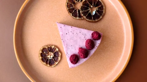 Raspberry or strawberry cheesecake, a slice of sweet red cake with berries. Rasp Stock Footage 321244332