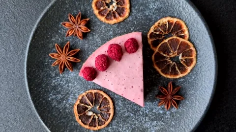Raspberry or strawberry cheesecake, a slice of sweet red cake with berries. Rasp Stock Footage 321244337