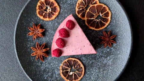 Raspberry or strawberry cheesecake, a slice of sweet red cake with berries. Rasp Stock Footage 321244339