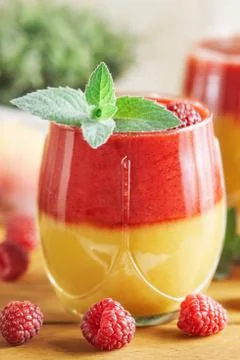 Raspberry peach smoothie Stock Photos