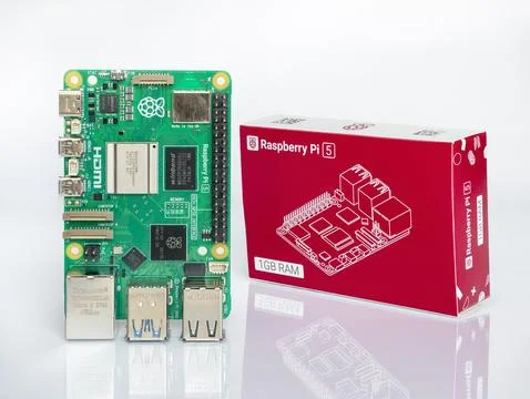 Raspberry Pi 5 1GB RAM single board computer with its official retail box Stock Photos