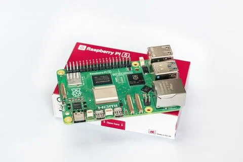 Raspberry Pi 5 single board computer lying on its original retail packaging Stock Photos