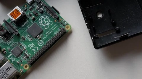 Raspberry Pi electronics close-up with components and case setup Stock Footage 312197918