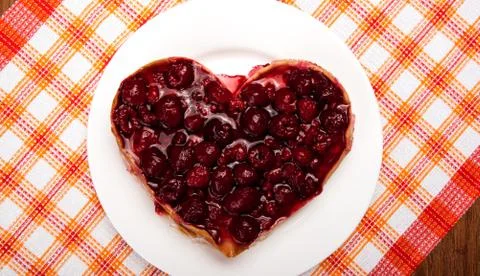 Raspberry pie in the form of heart Stock Photos