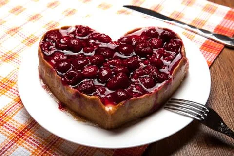 Raspberry pie in the form of heart Stock Photos