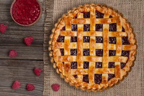 Raspberry pie with fresh raspberries. Top view Stock Photos