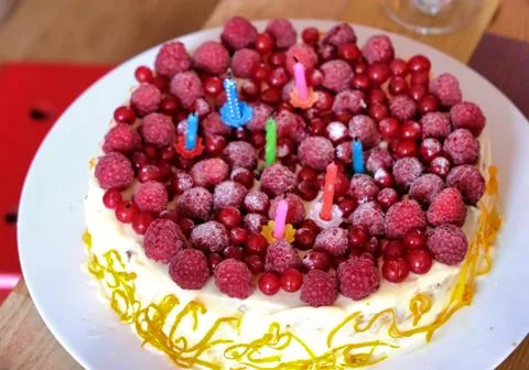 Raspberry pie on a plate on a table Stock Photos