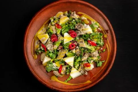 Raspberry, pineapple, lettuce and champignon salad with sauce. 스톡 사진