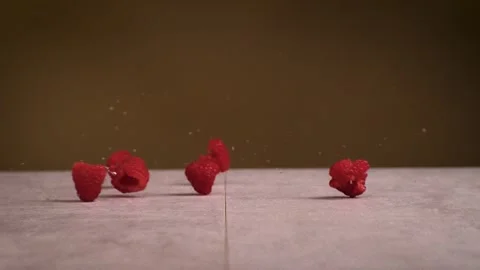 Raspberry rolling in super slow motion. high speed camera footage of Stock Footage 255568492