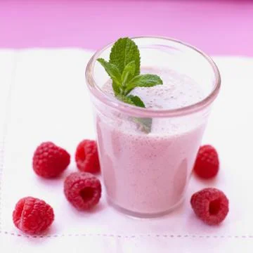 Raspberry shake with mint leaf Stock Photos