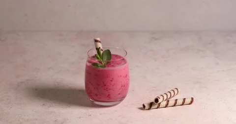 Raspberry smoothie in glass jar. Healthy refreshed homemade beverage. Stock Footage 194104932